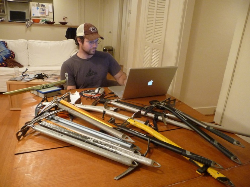 ice axe - ian nicholson carefully weighing each ice axe for the review.