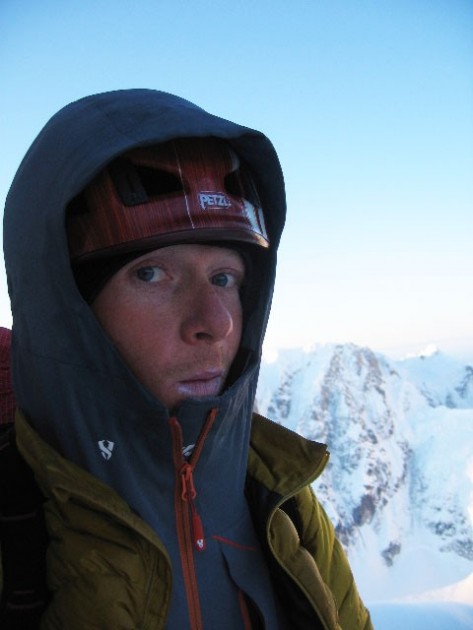 luke lydiard wearing a down insulation layer over his soft shell...