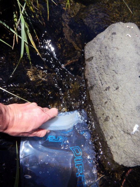 filling the dirty bag of the platypus gravityworks. it is a much...