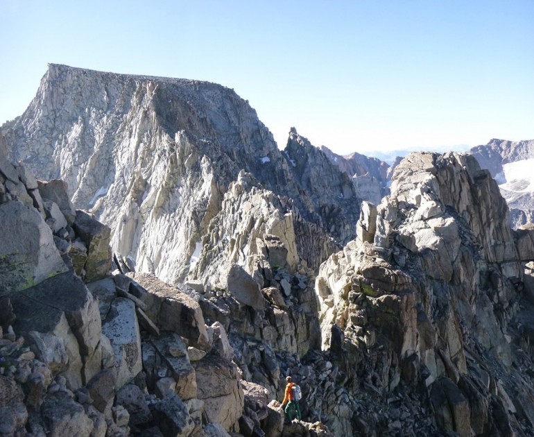 down jacket men - climbing big mountains in a lightweight down jacket.