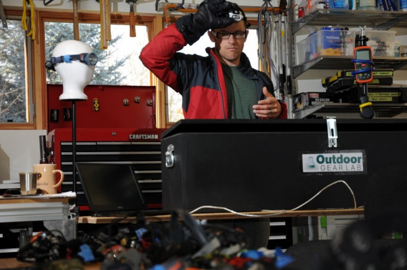 headlamp - chris mcnamara performing a gloved ease-of-use test. the black box...