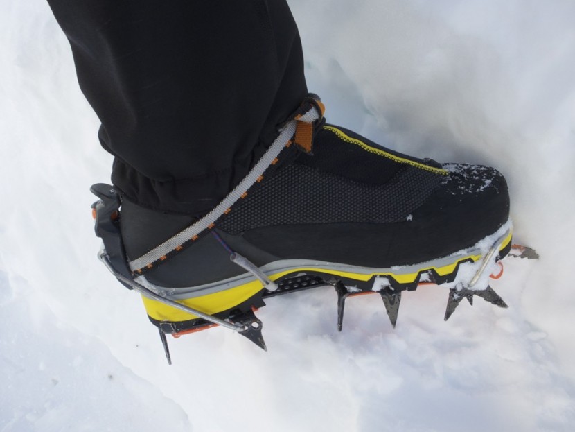 salewa pro gaiter - medial view of the salewa pro gaiter with a petzl lynx crampon...