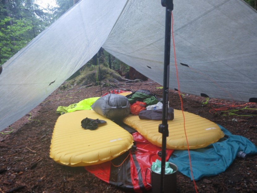 square flat tarp with two therm-a-rest neoair xlite sleeping pads...