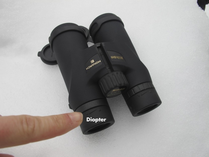 binoculars - the diopter knob is located on the eye-pieces and is adjustable...
