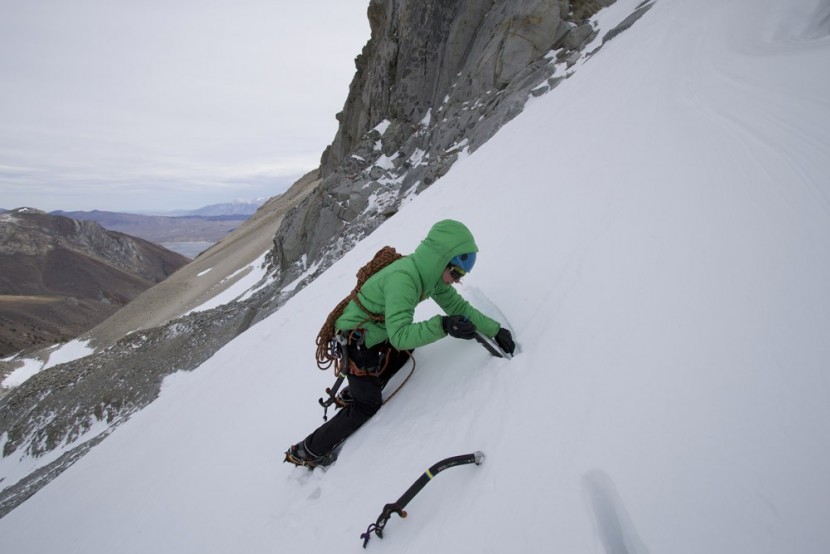 patagonia das parka for women - building a snow anchor while wearing the technical das parka, which...
