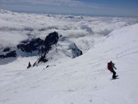 The author testing women's ski gloves while descending the Coleman...