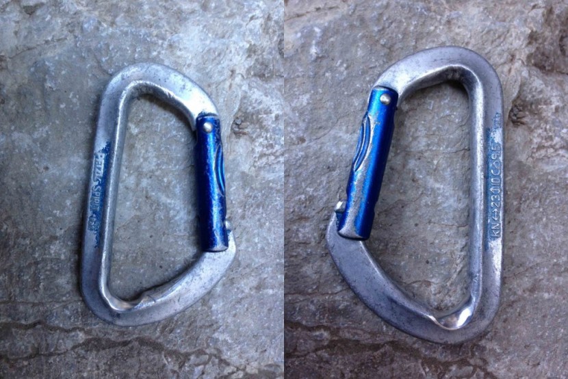 carabiner - the two sides of a petzl spirit used to lower off the top of a...