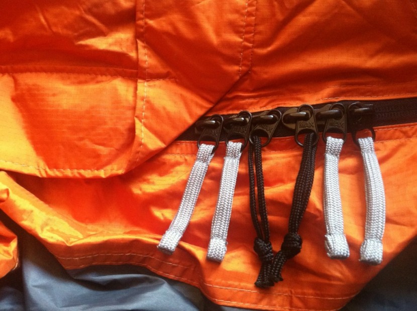 rei minimalist - arms can be popped out of the grey zippers while the black zippers...