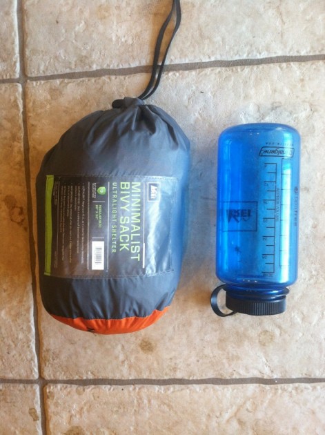 rei minimalist - the packaged bivy is just slightly larger than a 1-liter water...