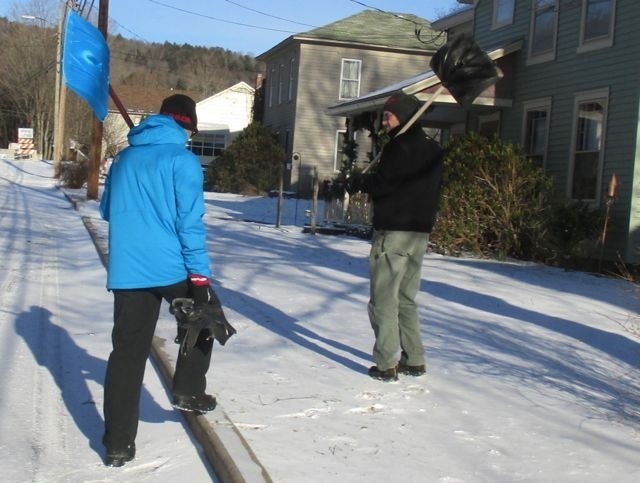 baffin arctic men - lead test editor jediah porter and his dad walking across town to...