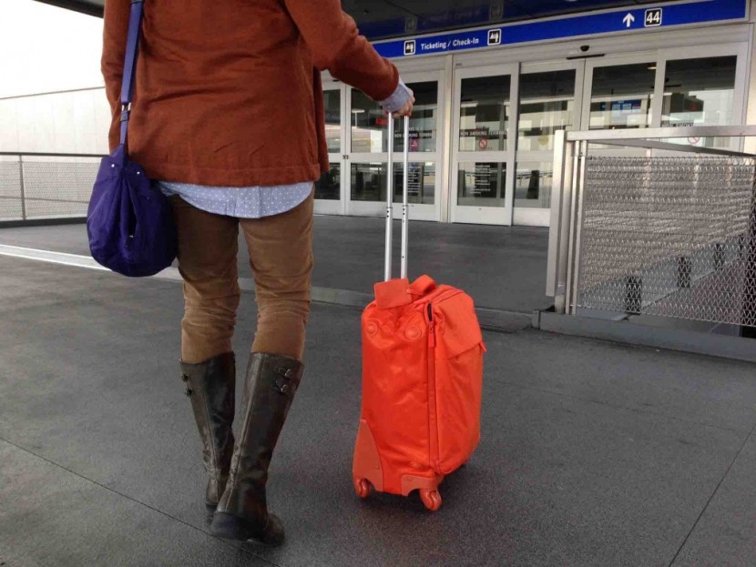 lipault paris plume 22 - pushing this bag into the airport thanks to its upright design and...