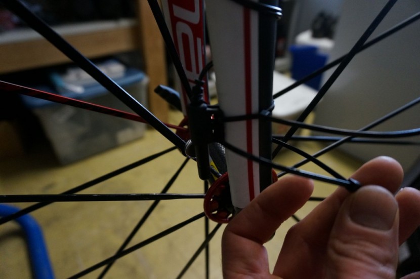 cateye velo 7 - wrapping the sensor wire up the front fork. this makes installation...