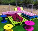 repurposed pallets and cable spools turned into chaise lounges and...