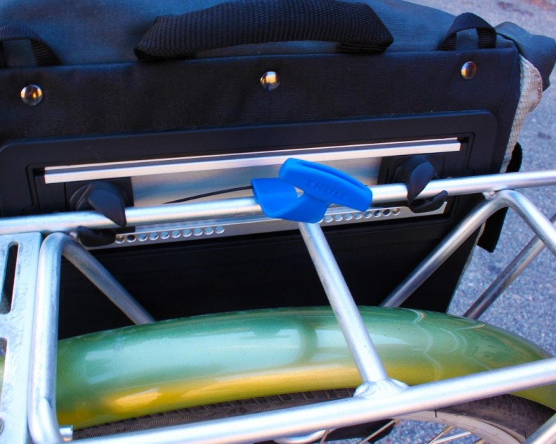 thule pack 'n pedal adventure touring - these attachments rotate by pulling on the tab, and once off the...