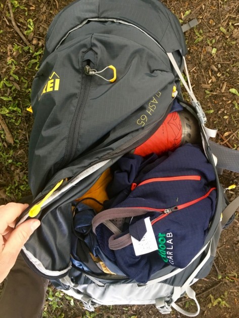 rei flash 65 - the large "j" shaped access zipper featured on the flash 65 allowed...