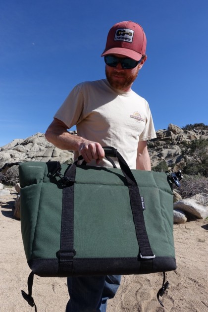 polar bear coolers 24 pack - the polar bear comes equipped with handles and a shoulder strap.
