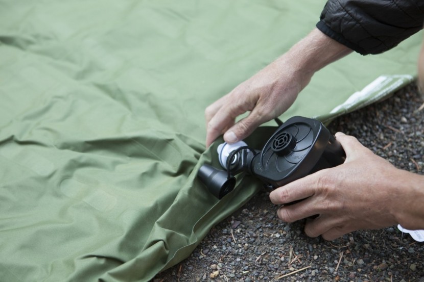 lightspeed 2 person - inserting the battery powered pump into the inflate part of the...