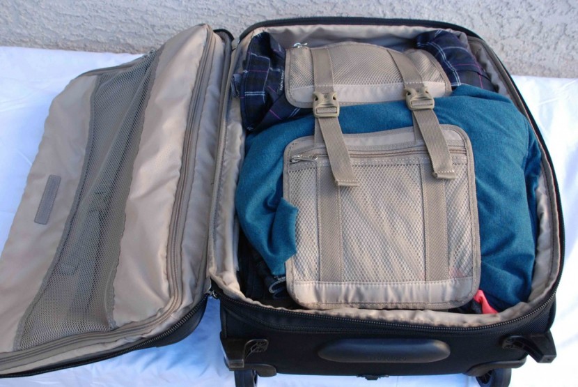 travelpro platinum magna 2 - the wide compression straps do a great job of securing all of our...