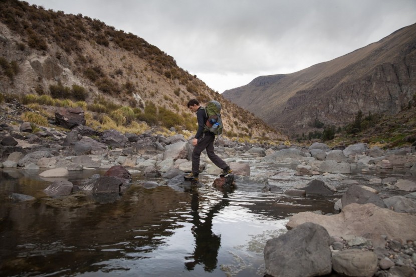 asolo jumla gv - testing traction and stability on the uneven rocks of a stream in...