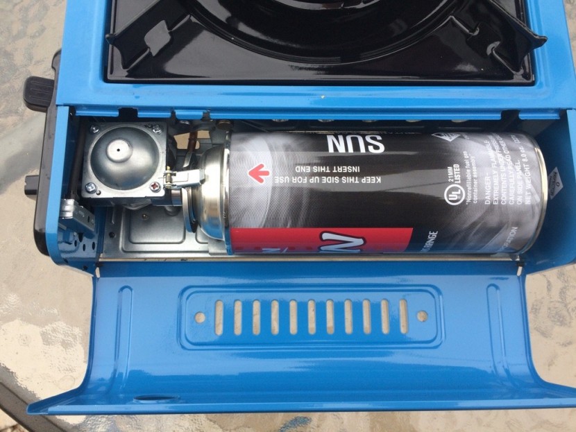 coleman butane instastart - the handy compartment for the butane canister is nice because it...