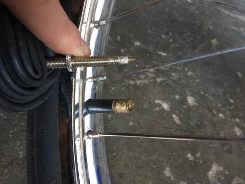 frame pump - examples of presta valve top, and schrader valve bottom.