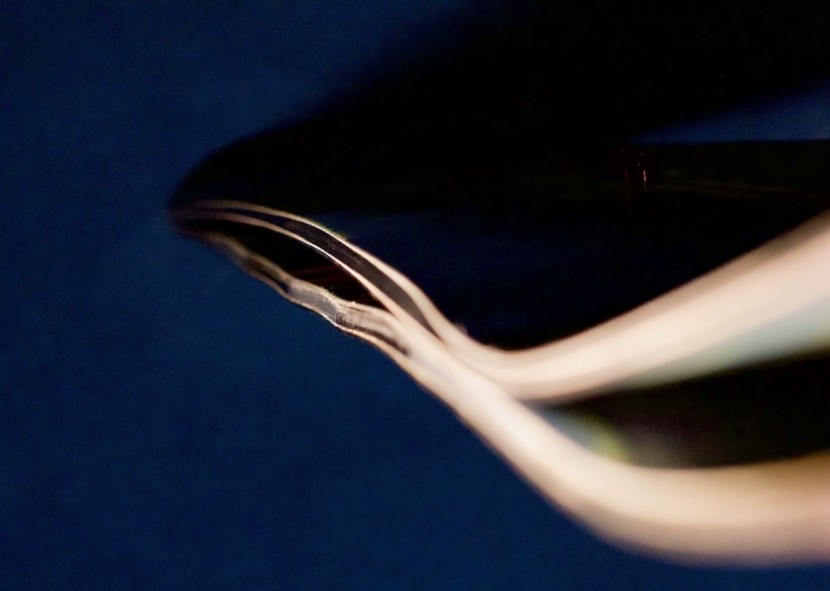 snowboard men - a cambered burton board on top, and a banana&#039;d lib-tech on bottom