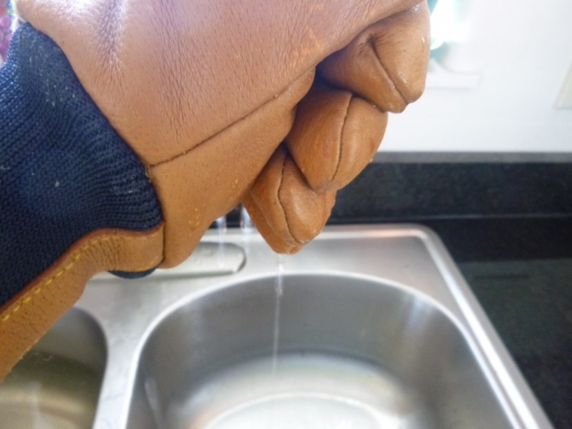 kinco pigskin leather - here we see the water draining from the kinco glove after the...