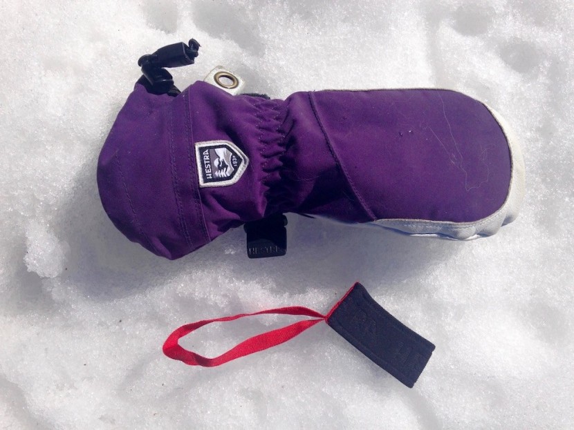 hestra heli mitt for women - here the hestra heli mitt is pictured with a detached leash.