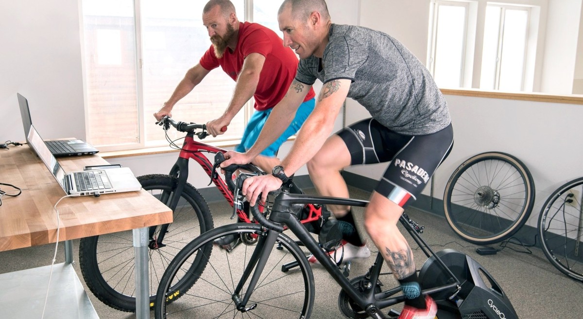 Best Bike Trainer Review (OGL testers enjoying the great road feel of the Hammer Direct Drive as the snow falls outside.)