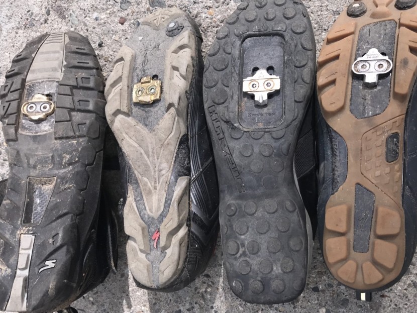 mountain bike pedals - cleats from left to right, crankbrothers, time, xpedo and shimano spd.