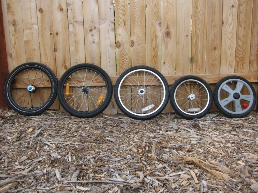 bike trailer - pictured from left to right: the wheels of 1) the thule chariot...