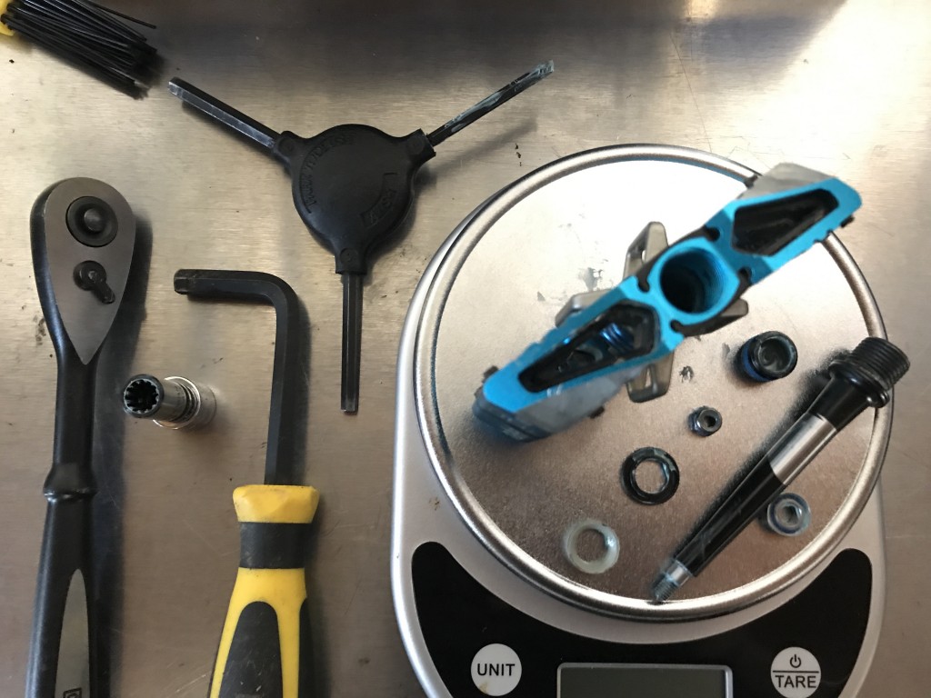 mountain bike pedals - checking out the internals. here is the partially disassembled...