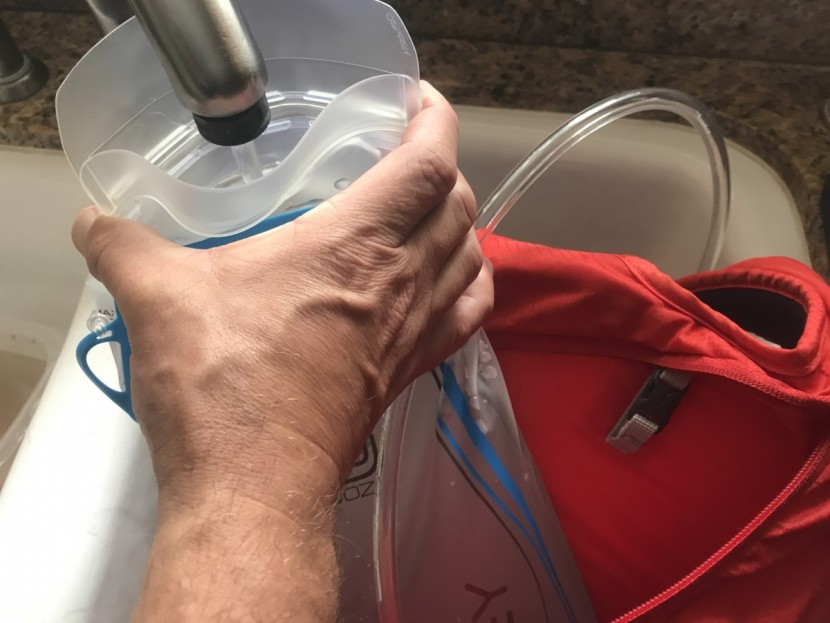 osprey raptor 10 - the raptor&#039;s pour shield makes for easy filling.