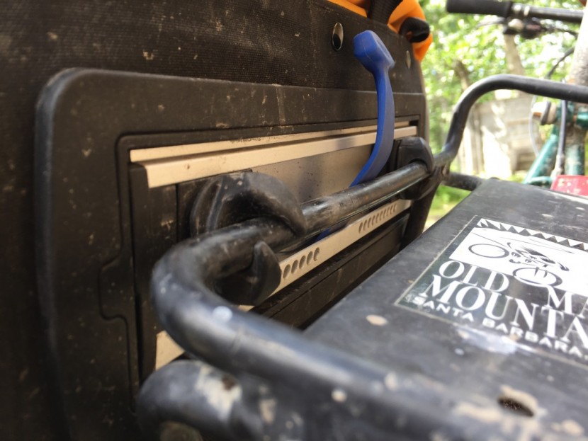 thule adventure touring - the twisting hooks of the adventure touring pannier lock onto any...