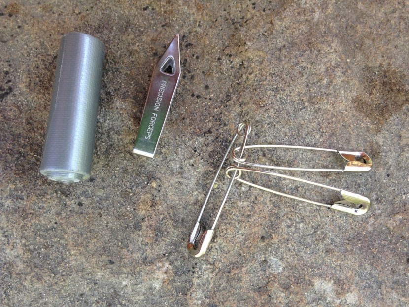 adventure medical kits ultralight/watertight .7 - the few tools included, duct tape, forceps and tweezers are good...