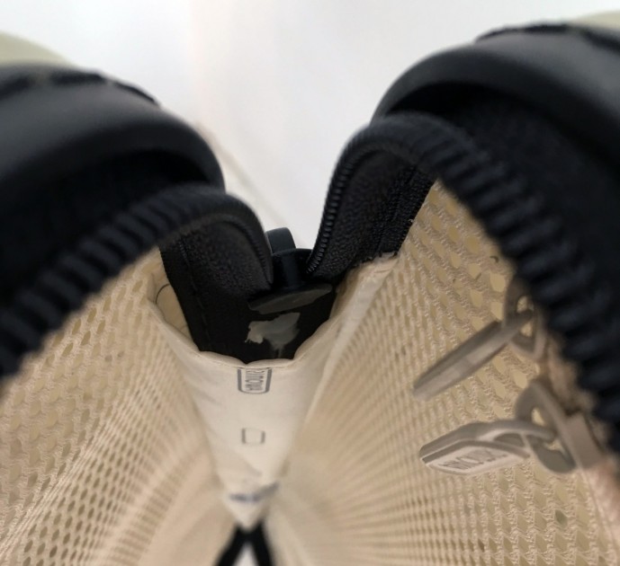 rimowa salsa air 29&quot; - hot-glue used in lieu of a proper zipper stop.