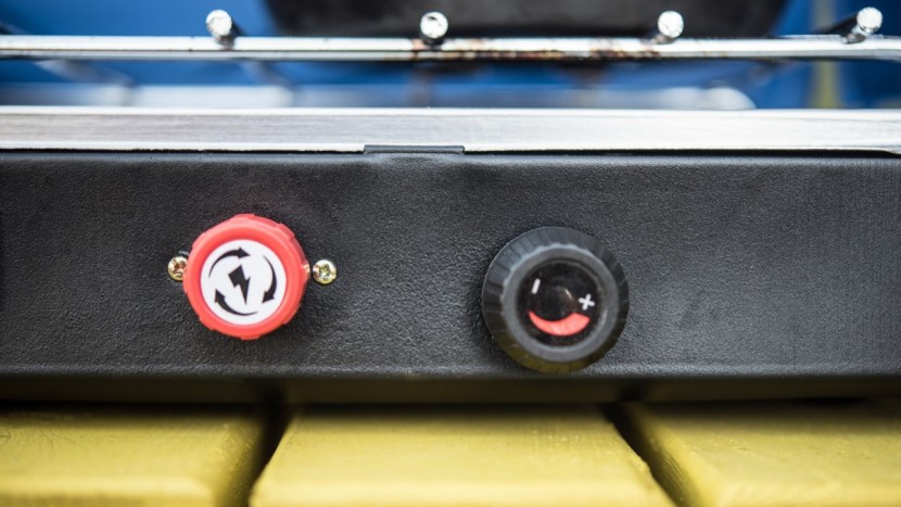 stansport outfitter series 2-burner - the piezo twist ignitor is on the left, with the flame adjustment...