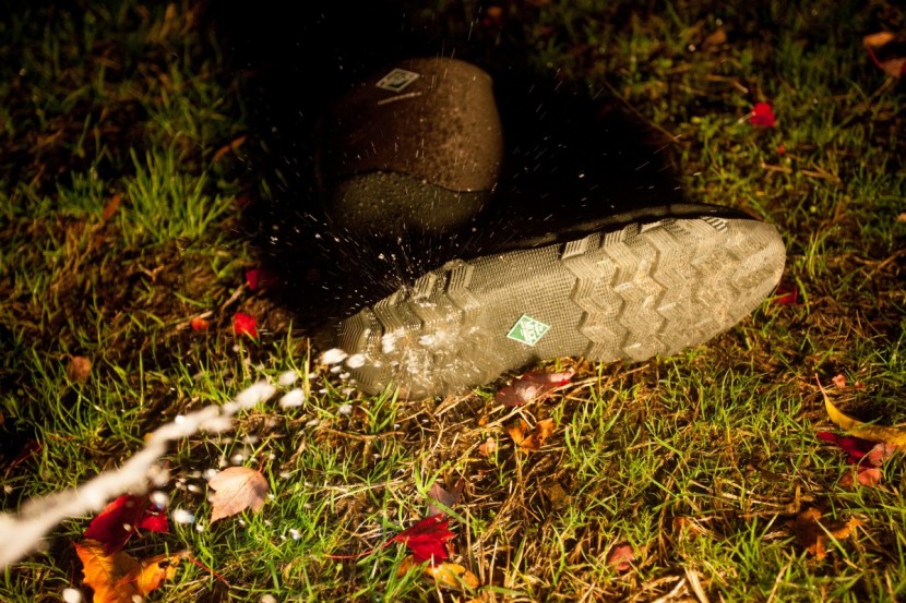 the original muck boot company edgewater ii - washing off the boot, you can see how minimal the tread is.