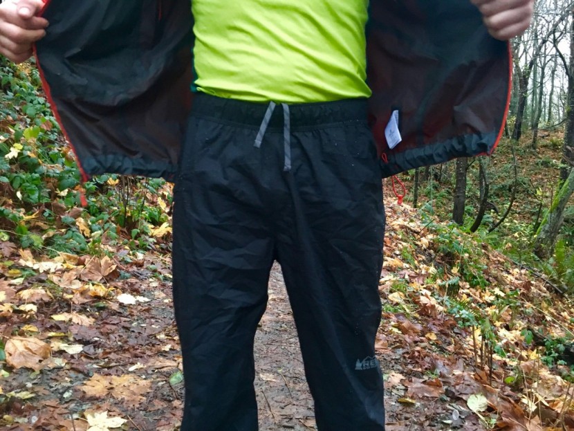rei co-op rain pants - the rei model features a low-profile waist belt, with a drawstring...