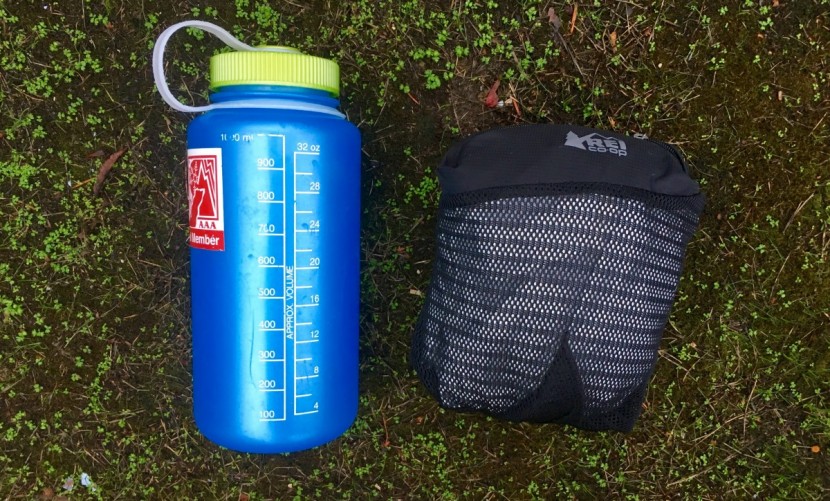 rei co-op rain pants - here the rain pants are shown compressed into their reversible...