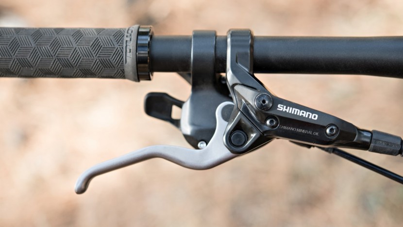 kona big honzo - shimano m315 brakes lack braking power and require a hefty squeeze.