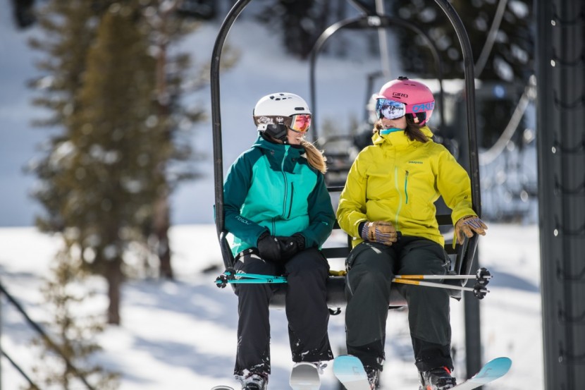 all mountain skis womens - the girls talk shop on the chair.