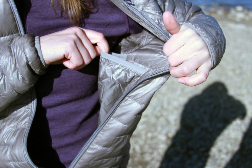 patagonia micro puff hoody for women - this jacket features large interior pockets, but no breast pocket.