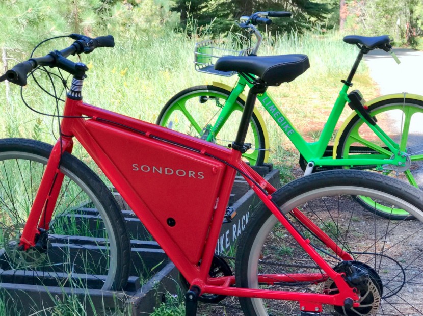 sondors thin 7 - the thin 7 next to a bikeshare limebike. we much prefer the speed of...