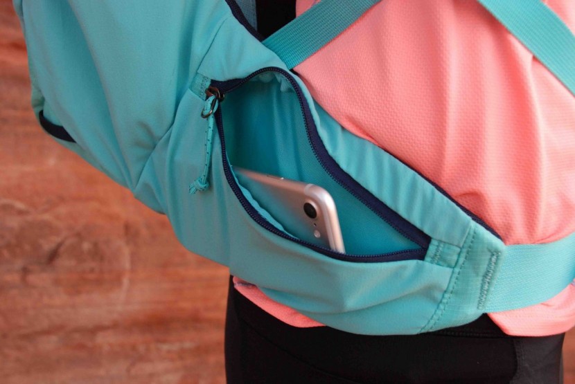 the hip belt pockets are large and fit our smartphones with some...