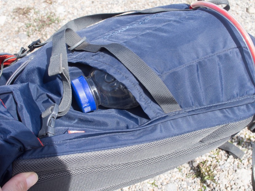 mountain hardwear scrambler 30 - if the pack is completely full, getting a one liter bottle in and...