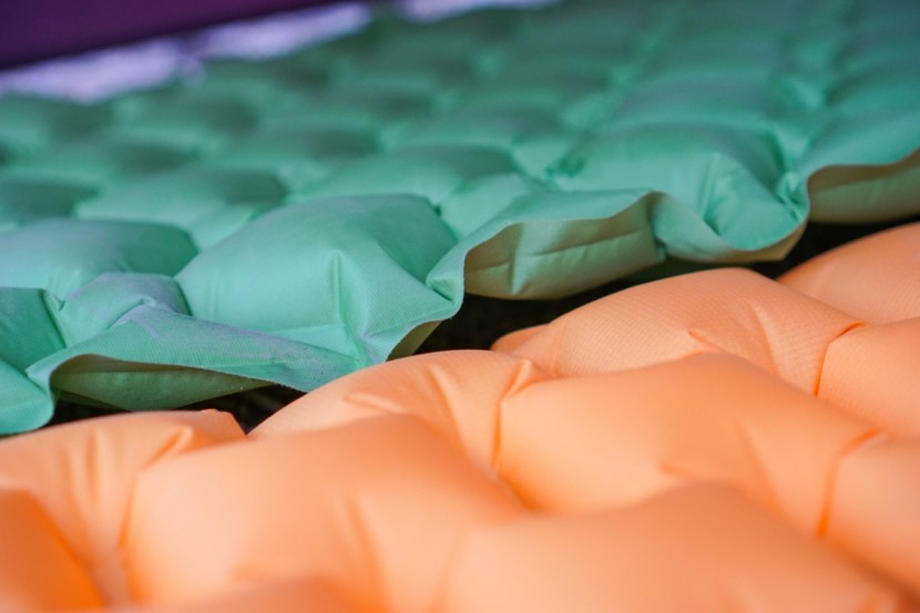 rei co-op flash all-season insulated air - the flash (foreground) has thicker, more comfortable baffles than...