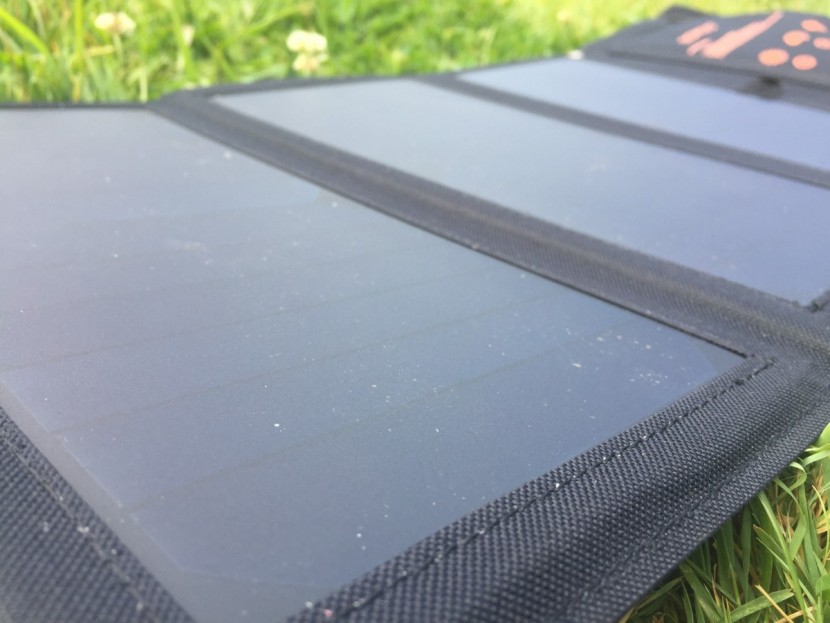 sokoo 22w 5v - a close-up of the sokoo solar cells shows the plastic coating that...