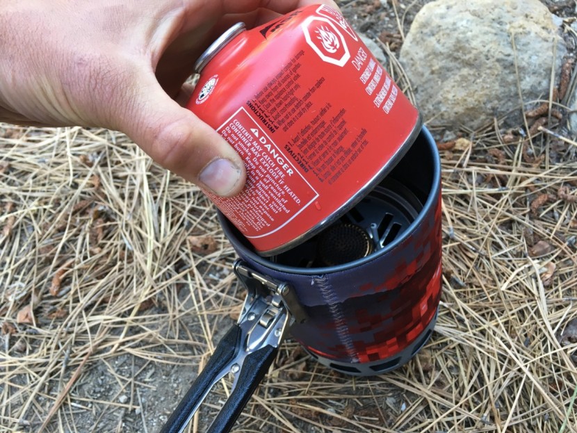 camp chef stryker multi-fuel - the pot on the stryker swallows it&#039;s burner and an 8 oz fuel canister.