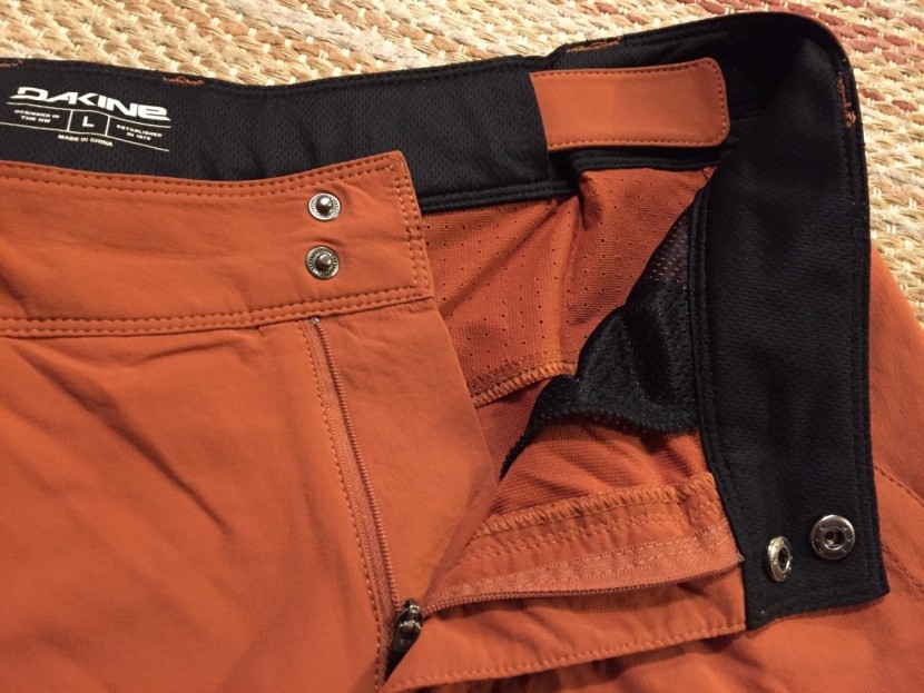 dakine syncline - the internal waist adjustment and snap/zipper closure of the...